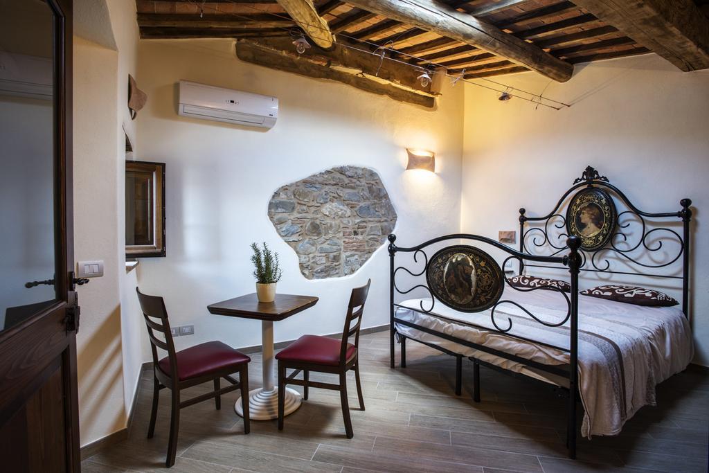 مبيت وإفطار Antico Borgo Seggiano الغرفة الصورة